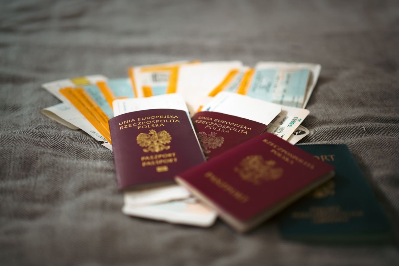 Offerings Close-up of Polish passports and travel tickets symbolizing travel and adventure.